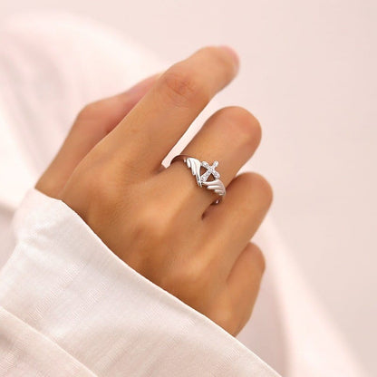 The Guardian Ring — Angel Wings and Cross with Crystal Detail (Adjustable)