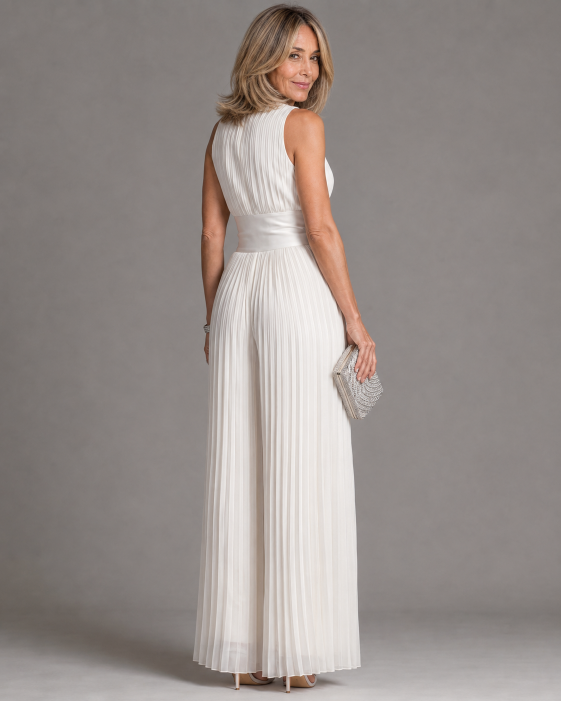 AURORA | PLEATED HALTER NECK WIDE-LEG JUMPSUIT
