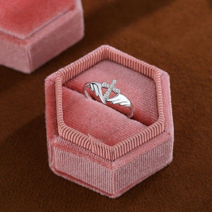 The Guardian Ring — Angel Wings and Cross with Crystal Detail (Adjustable)